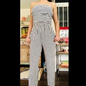 Brand new/never worn, black/white striped romper